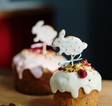 Easter-themed cupcakes with bunny toppers and rich frosting perfect for festive celebrations.